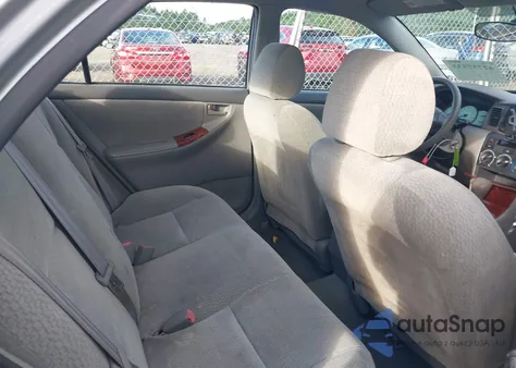 2004 Toyota Corolla Le z USA, uszkodzony, nr VIN 2T1BR38E14C258944